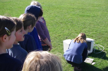 File:Computer on field.jpg