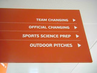 File:Sign of the SIA Times.jpg