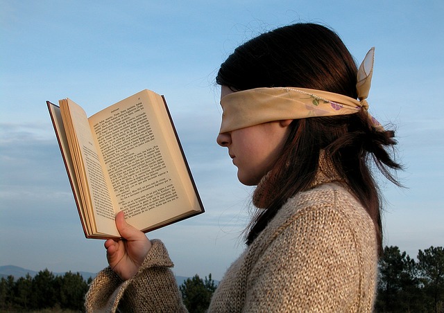 File:Read book blindfolded.jpg